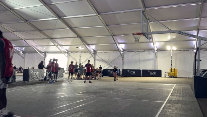HoopCity 3v3 game under a tent